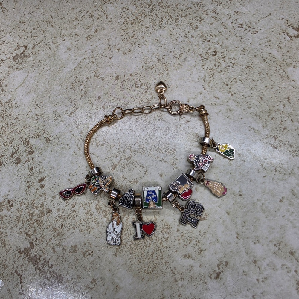 Taylor Swift Swifty Charm Bracelet 11 Enamel Charms Gold Tone - Picture 1 of 8